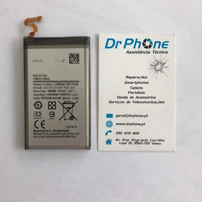 Bateria de telemóvel e cartão de visita da empresa Dr Phone