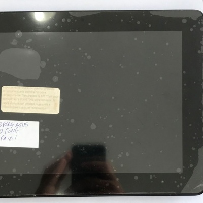 Tablet preto com notas coladas e cartão de visita Dr Phone ao lado.