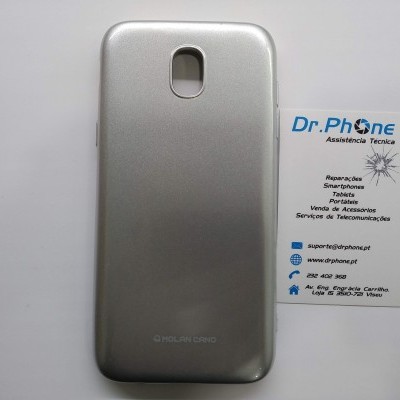 Capa protetora de smartphone prata ao lado de cartão de visita