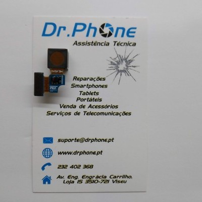 Cartão de visita da Dr.Phone Assistência Técnica com componente eletrônico em cima