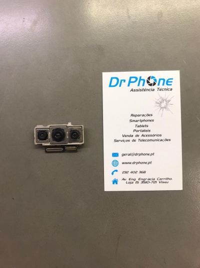 Módulo de câmara de smartphone e cartão de visita DrPhone em superfície cinzenta