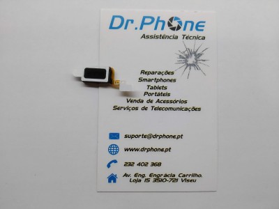 Componente eletrônico sobre cartão de visita da assistência técnica Dr.Phone