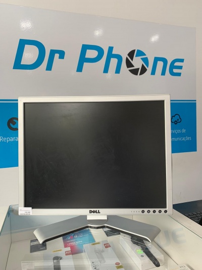 Monitor Dell prateado com ecrã preto numa loja Dr Phone