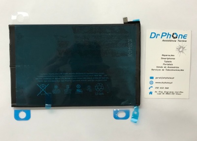 Bateria preta com texto branco ao lado de cartão de visita branco da DrPhone