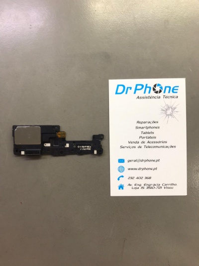 Componente eletrónica preto e cinzento ao lado de cartão de visita Dr Phone