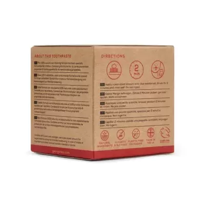 Caixa de papelão com texto informativo e instruções para pasta de dentes