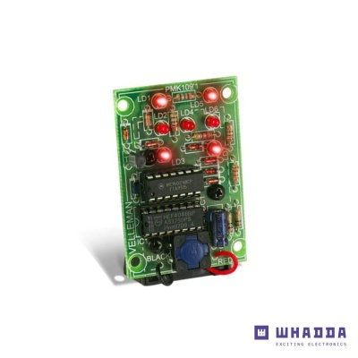 Placa eletrónica verde com LEDs vermelhos acesos e componentes diversos