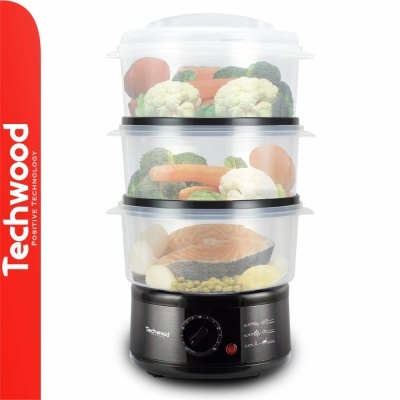Vaporiera eléctrica preta Techwood com três compartimentos transparentes com legumes e salmão