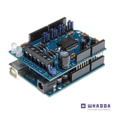 Placa eletrónica azul com componentes e conectores USB e jack