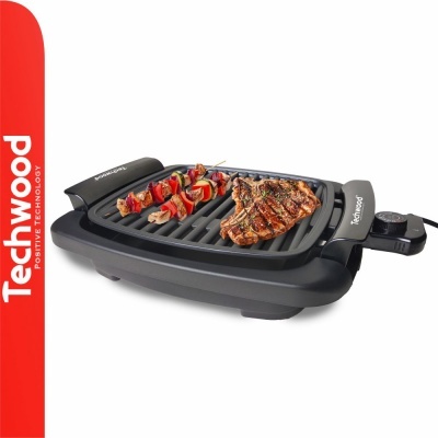 Grelhador elétrico Techwood com peças de carne e vegetais grelhados
