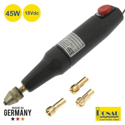 Ferramenta elétrica preta com botão vermelho e três pontas metálicas douradas