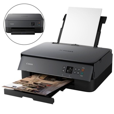 Impressora Canon PIXMA preta a imprimir fotografia