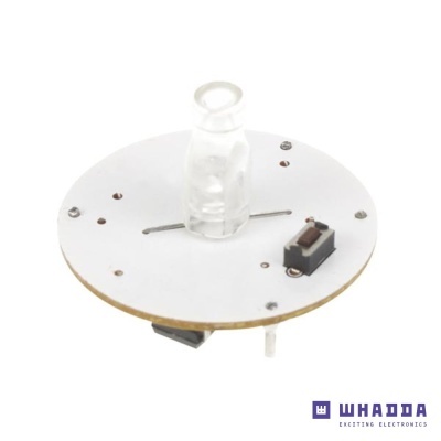 Placa eletrónica circular branca com componentes e peça plástica transparente