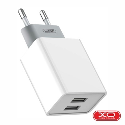 Carregador de parede branco com duas portas USB e dois pinos redondos XO
