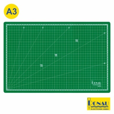 Tapete de corte verde A3 com padrões de grade branca e linhas de ângulo