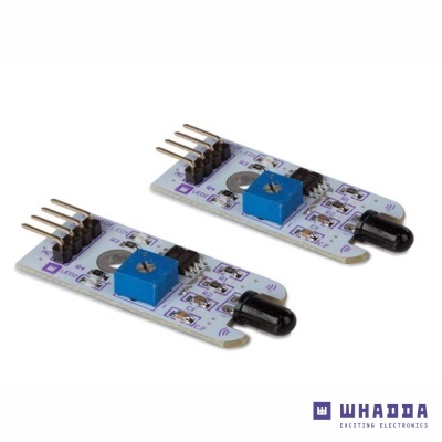 Dois sensores eletrónicos retangulares em placa branca com componentes azuis e pretos