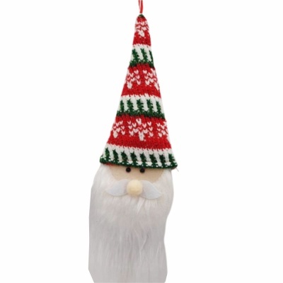 Figura decorativa de Natal com chapéu alto colorido e barba branca.