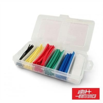 Caixa transparente com tubos termorretráteis coloridos organizados em cinco compartimentos.