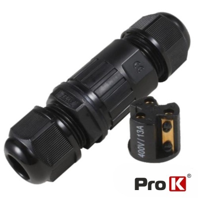 Conector elétrico cilíndrico preto com componente separado e inscrição 400V/13A