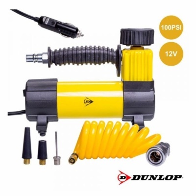 Compressor de ar portÃ¡til Dunlop amarelo e preto com mangueira em espiral e bicos adaptadores.