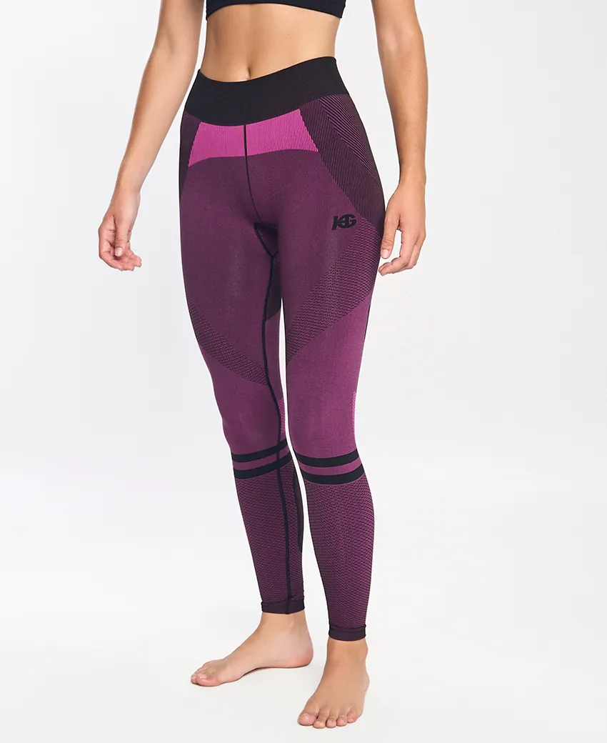 Calças de treino compridas roxas com padrão geométrico e logo K6 no lado esquerdo