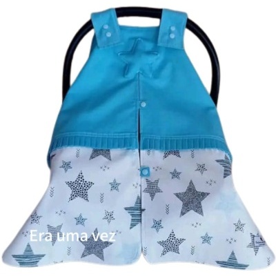 Produto têxtil azul turquesa e branco com estrelas e texto 'Era uma vez'