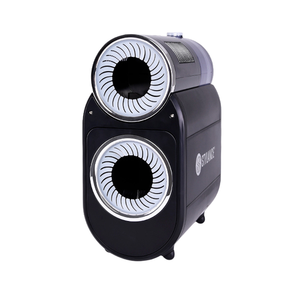 Dispositivo eletrônico preto com dois orifícios circulares frontais e texto Saturnus