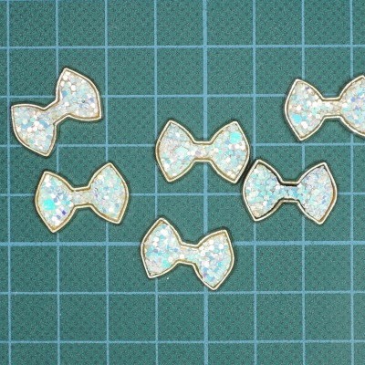 Tacha Laço 13mm x 20mm com Glitter Termocolante