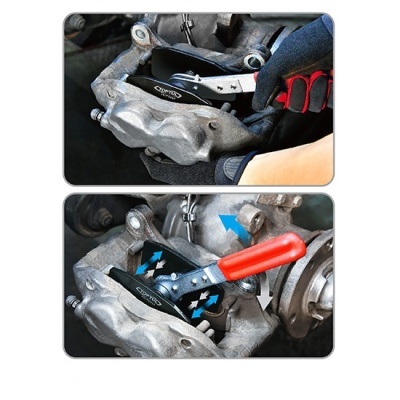 Ferramentas manuais para mecânica automóvel com punhos preto e vermelho a ajustar motor