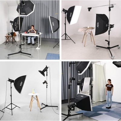 Estúdio de fotografia com iluminação Godox e equipamentos variados