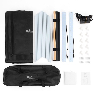 Conjunto de acessórios de estúdio fotográfico com tecidos pretos, hastes brancas e barras LED azuis