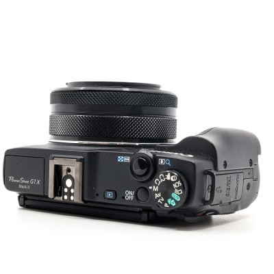 Câmara fotográfica Canon PowerShot G1X Mark II preta com lente e mostrador de modos