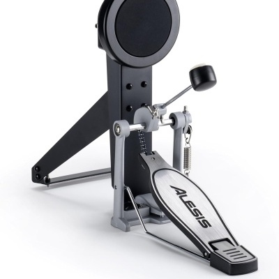 Pedal para bateria eletrónica Alesis cinzento com almofada preta circular