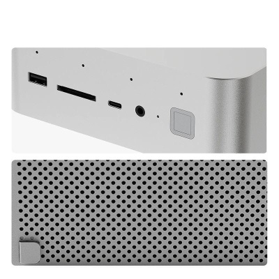 Dispositivo electrónico cinzento prateado com várias portas e superfície perfurada