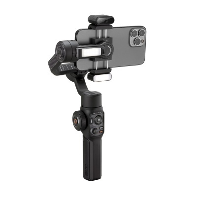 Estabilizador gimbal preto para smartphone com luz LED e smartphone cinzento
