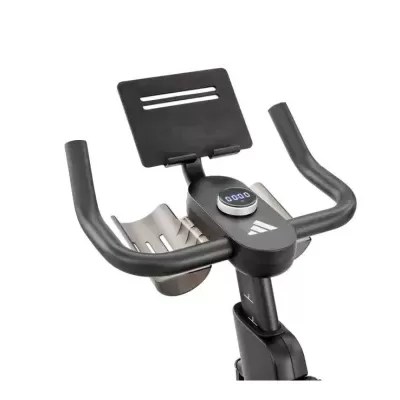 Bicicleta estática preta com punhos curvos e ecrã digital