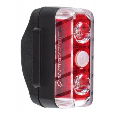 Luz traseira de bicicleta vermelha com corpo preto e LEDs visíveis