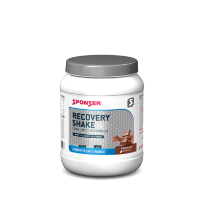 Embalagem de suplemento nutricional Recovery Shake sabor chocolate com rótulo informativo