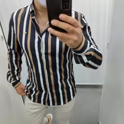 https://www.galerias-martins.pt/product/camisa-slim-fit-risca-preto-branco-camel