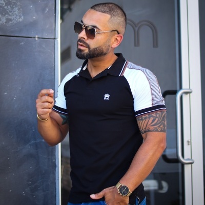 https://www.galerias-martins.pt/product/polo-slim-fit-preto-com-manga-branca-veste-justo
