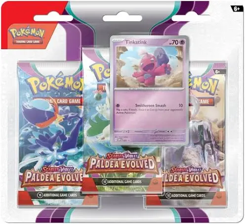 Conjunto de três pacotes de cartas Pokémon com carta Tinkatink visível e embalagem colorida