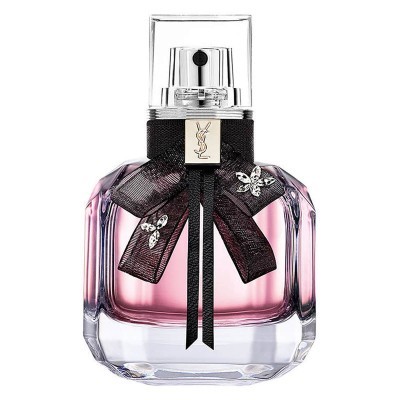 Frasco de perfume rosa transparente com fita preta e placa YSL