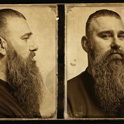 Retratos vintage de homem com barba e cabelo penteados