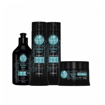 Conjunto de produtos capilares Haskell Cachos Sim! com shampoo, condicionador, máscara e frasco adicional, embalagem preta com etiquetas azuis e brancas.