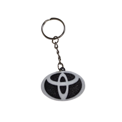 Chaveiro com símbolo Toyota preto e branco