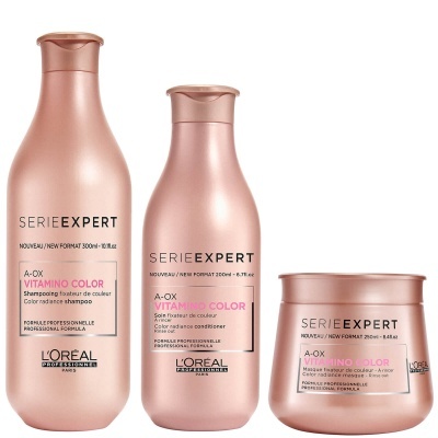 Conjunto de shampoo, condicionador e máscara para cabelo da linha SERIE EXPERT da L'Oréal, embalagem rosa metálica.