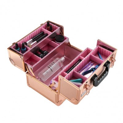 Estojo de maquilhagem dourado com interior rosa e pincéis