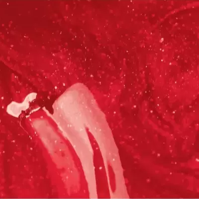 Superfície vermelha com tinta e duas linhas líquidas cor de rosa