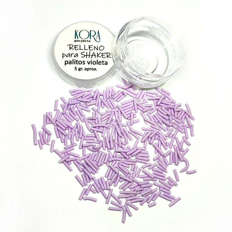 Frasco aberto com palitos violetas espalhados e tampa com texto em português.