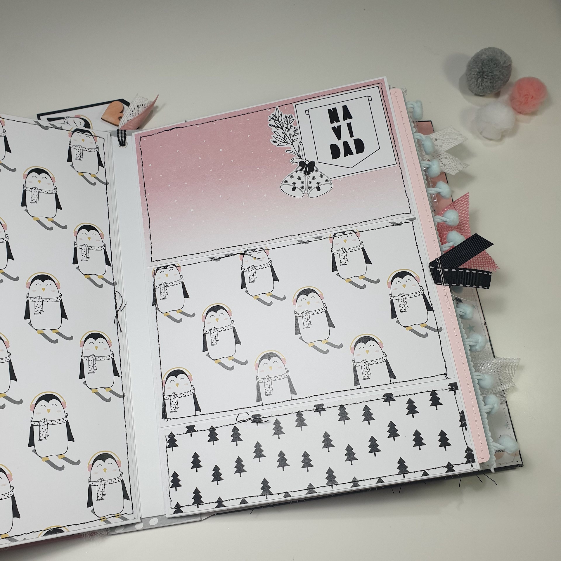 Página de scrapbook com pinguins, árvores e texto NAVIDAD